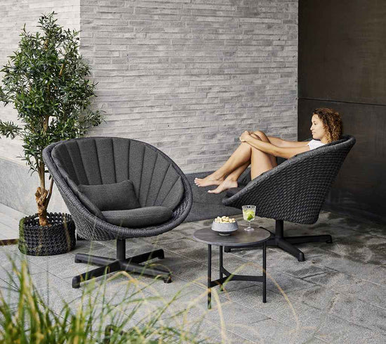 Cane-Line Peacock lounge Chair with Swivel Aluminium Base in Dark Grey