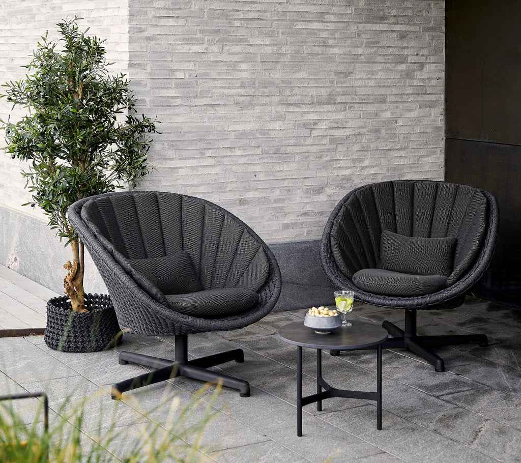 Cane-Line Peacock lounge Chair with Swivel Aluminium Base in Dark Grey