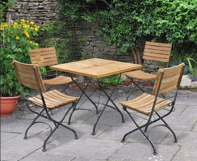 Why the Most Cultured Patios Fold: The African Teak Folding Bistro Table Reimagined