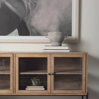 Mercana Arelius Light Brown Wood Black Metal Base with 4 Glass Cabinet Doors Sideboard